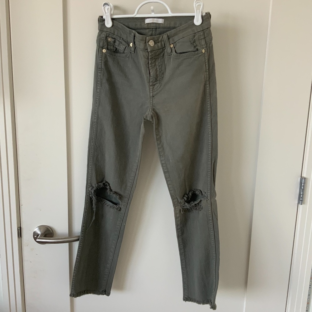 Green ripped jean